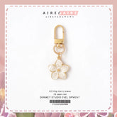 Cute And Elegant White Pear Flower Airpods Key Chain U Disk Anti-Lost Accessory Bag Zipper Buckle Flower Pendant